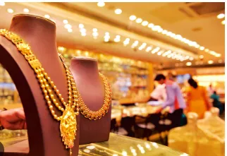 Gold prices recover from one-week low amid Dollar decline and wedding season demand