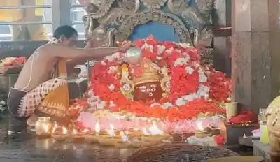 Maa Tarini adorned in golden attire for Maha Saptami at Ghatagaon