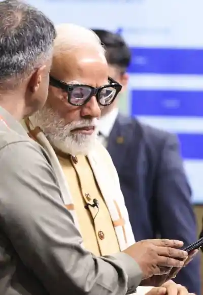 Prime Minister Modi tests indigenous Sarvam Kaze AI smart-glass at New Delhi technology summit