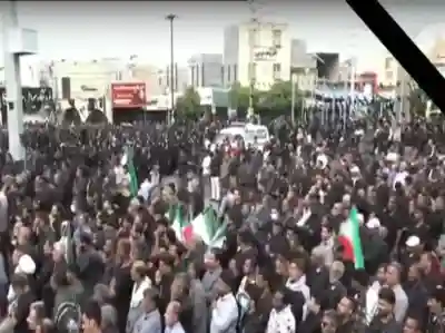 Thousands take to the streets after US-Israeli strikes kill over 150 schoolgirls in Iran