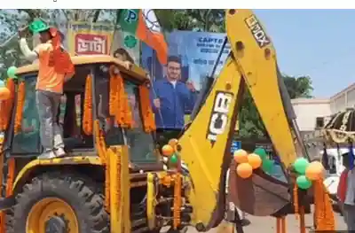 BJP candidate rides bulldozer to file his nomination in Bengal 