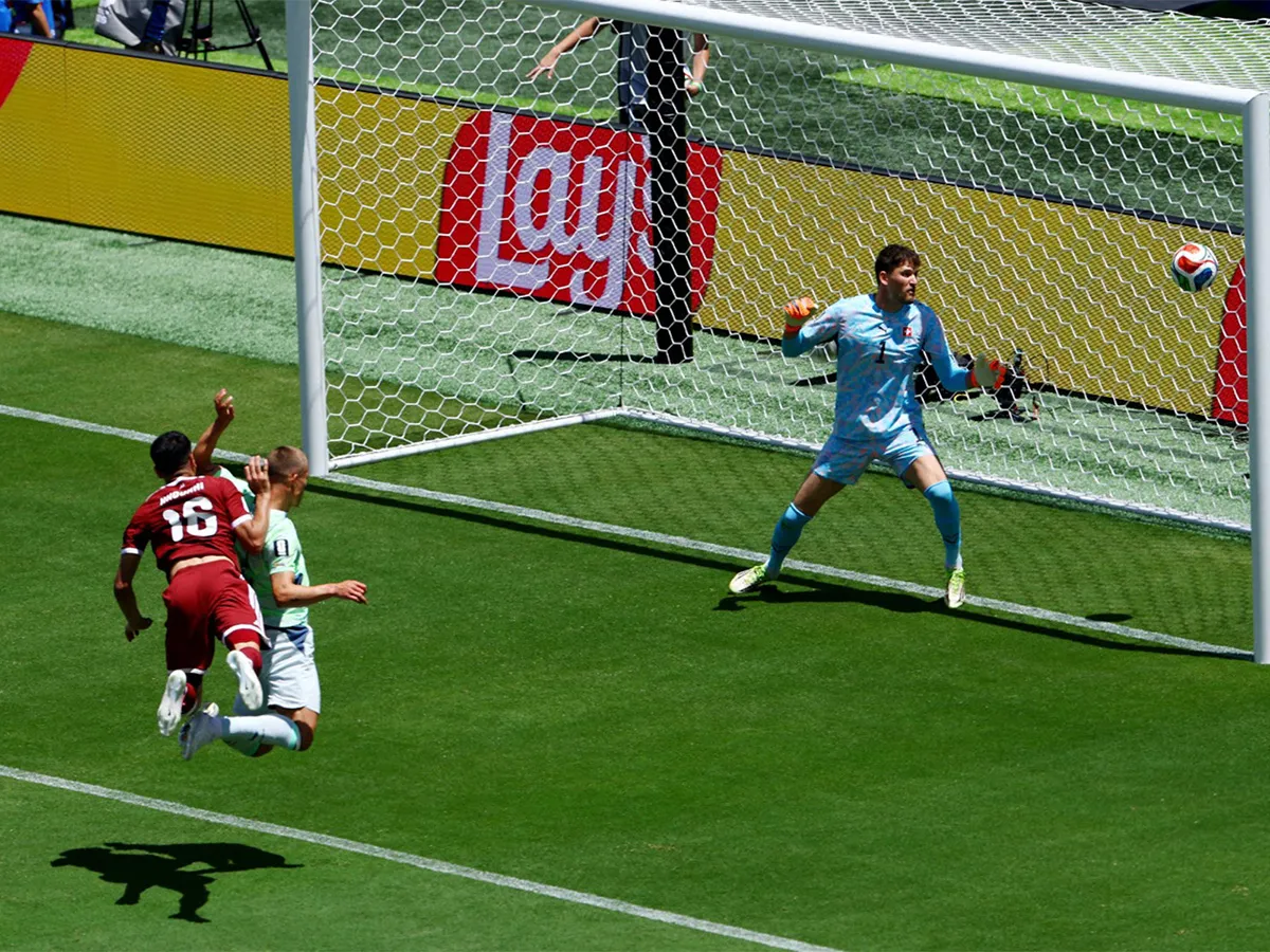 Qatar clinches historic first FIFA World Cup point with dramatic injury time equalizer against Switzerland