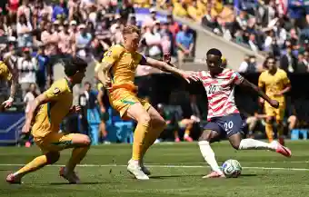United States advances to knockout stage after defeating Australia 2-0