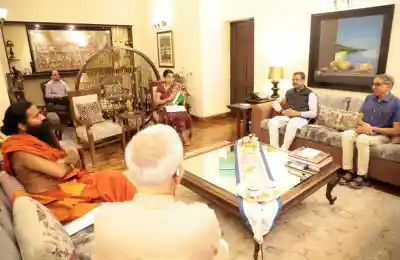 Union Education Minister Dharmendra Pradhan calls on Yoga Guru Swami Ramdev; Seeks blessings & helathy tips from Baba