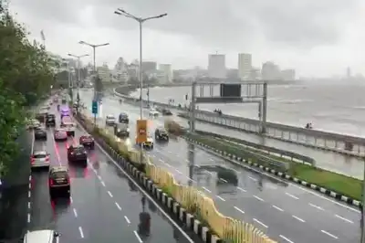 IMD forecasts heavy rain, strong winds over Mumbai; waterlogging disrupts Western Railway Services
