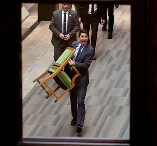 A Playful Exit: Justin Trudeau bids farewell to Canada parliament with chair in hand