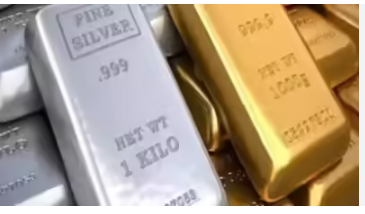 Silver surges, Gold dips slightly amid market volatility