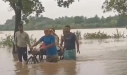 Odisha Floods: Doctor transports pregnant woman on cart through waist-deep water in Kendrapara