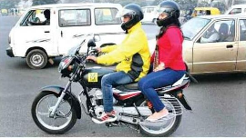 Govt proposes mandatory two helmets with every two-wheeler to boost road safety