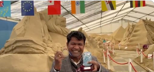 Odia sand artist Sudarsan Pattnaik honoured in UK for featuring World Peace with pebbles